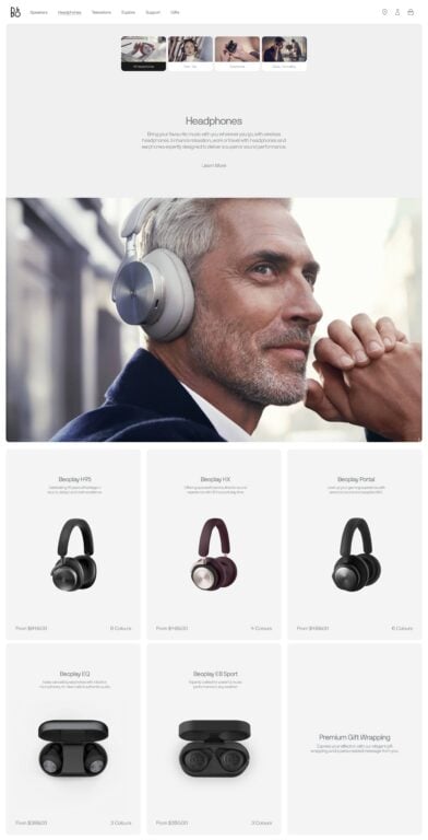 Headphones category web page with a grey-haired man in silver headphones above a grid of Beoplay products, for Bang & Olufsen.