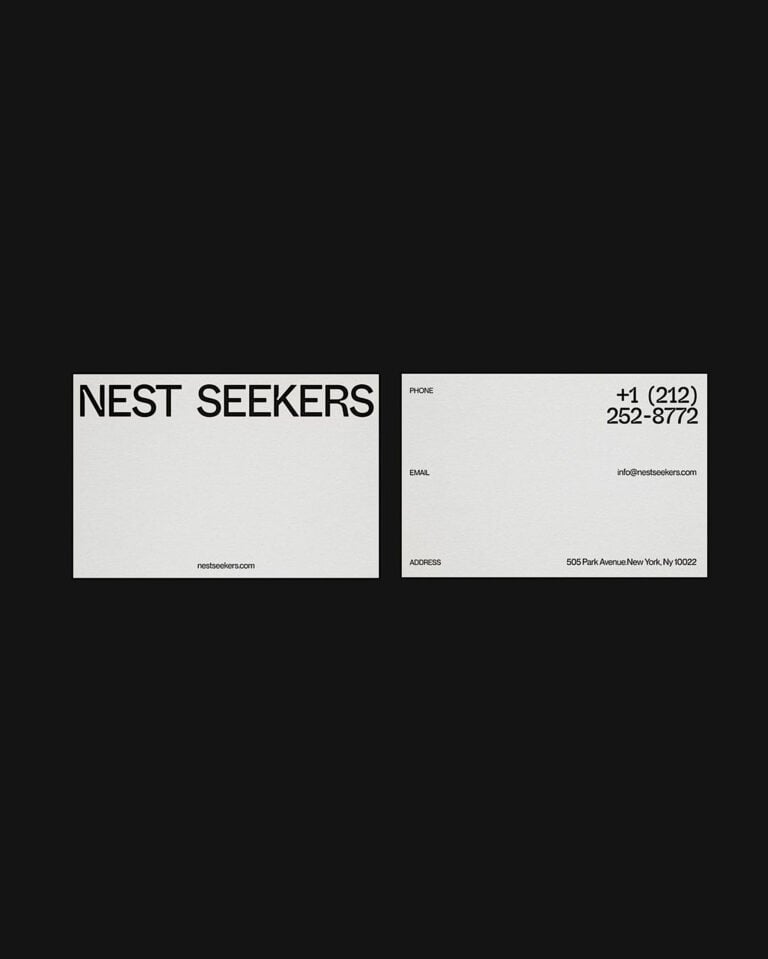 White business cards on black, front with black wordmark and back with phone, email and Park Avenue address, for Nest Seekers.
